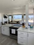 Kitchen with an amazing view of ocean and volleyball nets